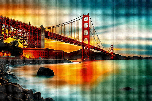 Diamond Painting mit Golden Gate Bridge bei Sonnenuntergang über ruhigem Wasser. Mockup.