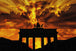 Diamond Painting mit Brandenburger Tor als Silhouette vor goldenem Sonnenuntergang und dramatischen Wolken. Mockup.