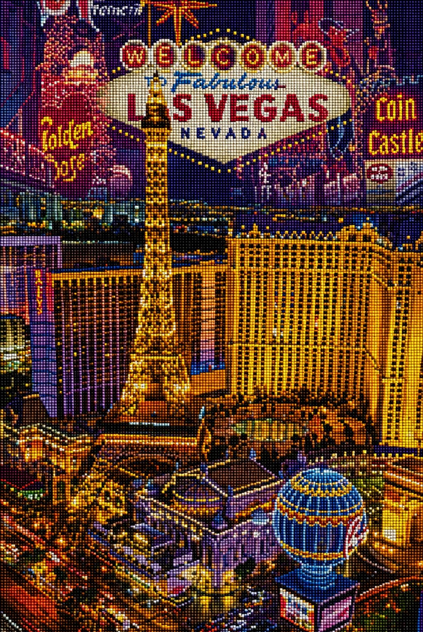 Diamond Painting mit beleuchteter Las-Vegas-Skyline, Eiffelturm und Welcome-Schild bei Nacht. Mockup.