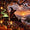 Diamond Painting mit Hexe, schwarzer Katze, Zauberkessel, Herbstlaub und Sonnenuntergang über einer Berglandschaft.