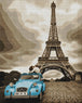 Diamond Painting mit Eiffelturm und hellblauem Oldtimer vor einer Pariser Stadtkulisse. Mockup.