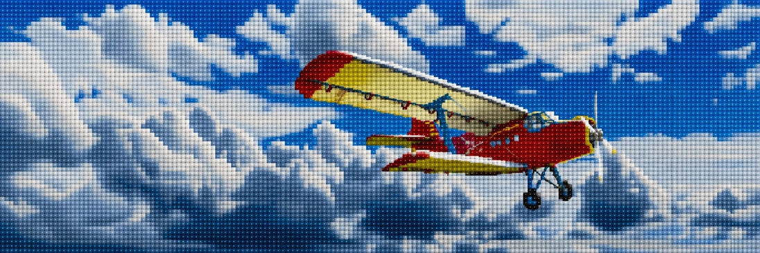 Diamond Painting mit rotem Propellerflugzeug vor blauem Himmel und weißen Wolken. Mockup.