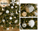 Detailansicht eines kuenstlichen Weihnachtsbaums mit goldenen und weissen Kugeln, Schleifen und Ornamenten
