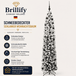 Schmaler schneebedeckter künstlicher Weihnachtsbaum mit platzsparender konischer Form und schwarzem Metallständer