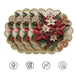 vierteiliges Weihnachts Tischset mit roten Weihnachtssternen, Tannengrün und festlichen Ornamenten