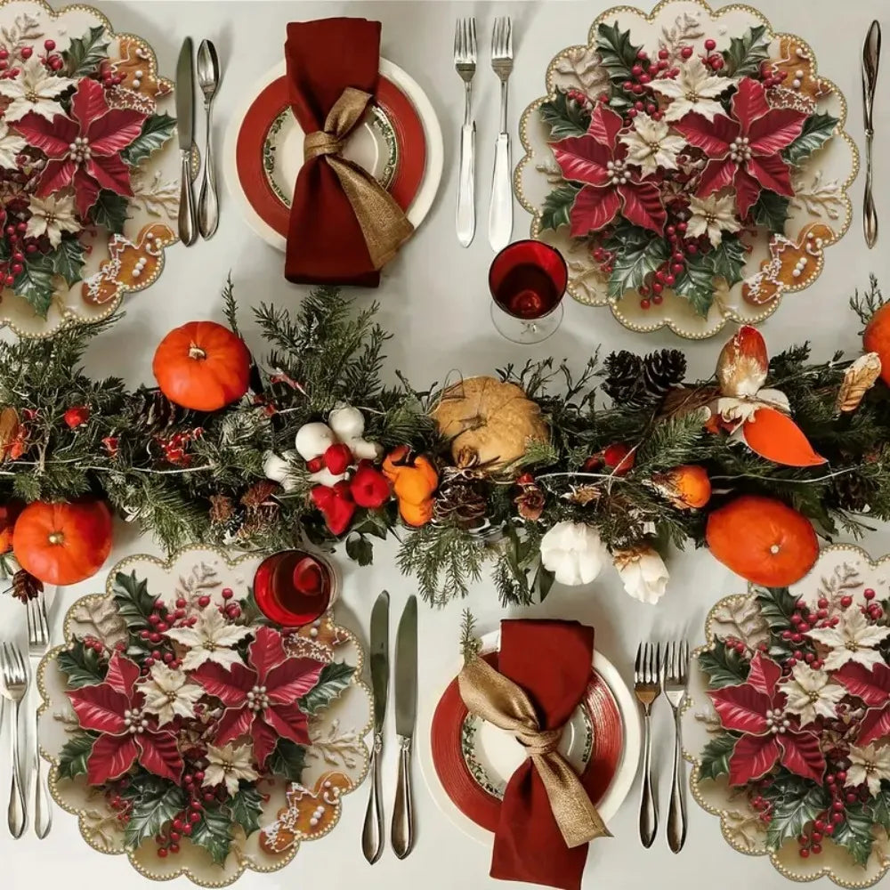 Festliche Tischsets mit roten Weihnachtssternen und winterlichen Pflanzenmotiven auf einer weihnachtlich gedeckten Tafel