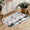 Grey Christmas runner with three winter gnomes and snow motif as a decorative carpet for hallway and entrance area