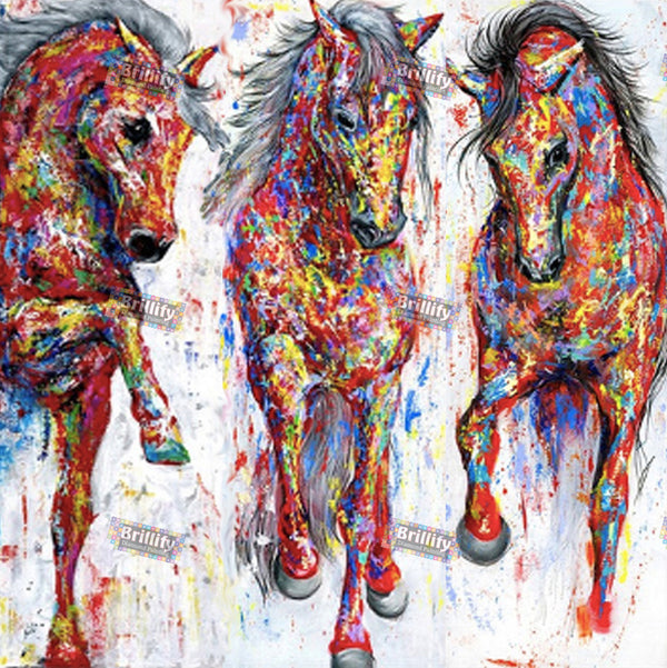 Diamond Painting drei galoppierende Pferde in einer bunten, abstrakten Farbexplosion.