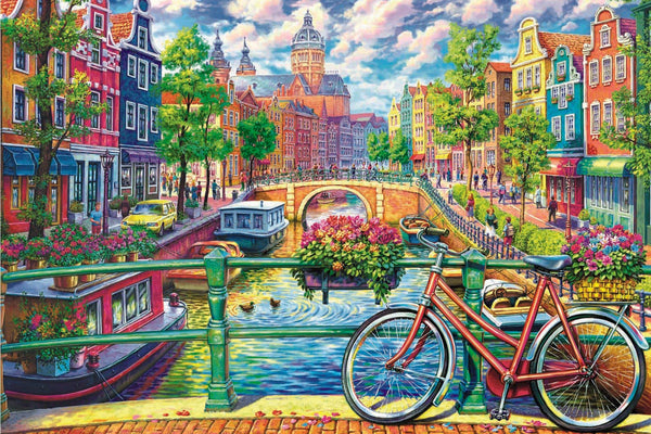 Diamond Painting mit Amsterdamer Grachten, Fahrrad, Brücke, Booten und bunten Giebelhäusern.

