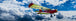 Diamond Painting mit rotem Propellerflugzeug vor blauem Himmel und weißen Wolken.